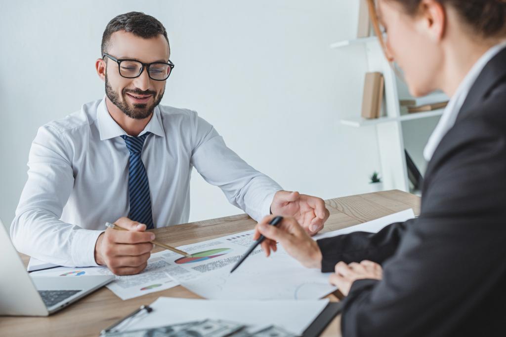 Professional advisors conducting a business loan annual review