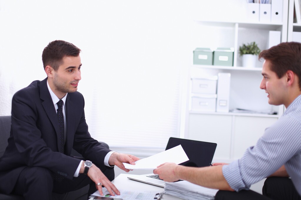 A financial expert sharing business advice to client.