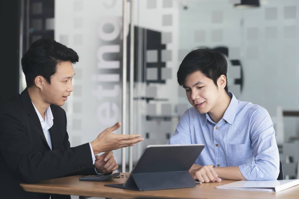 Financial expert helping client manage mortgage stress
