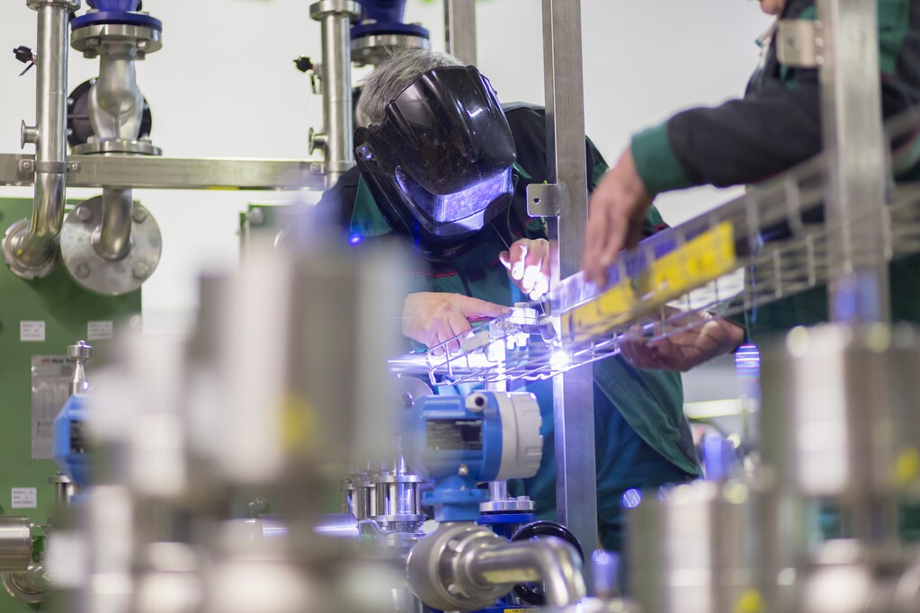 Employee working at a small manufacturing business