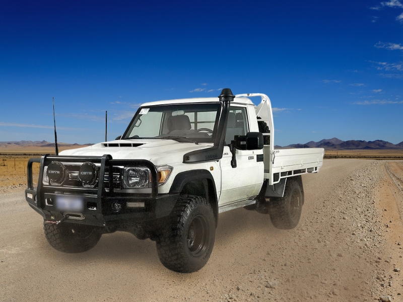 Landcruiser 2020 driving on a dirt road