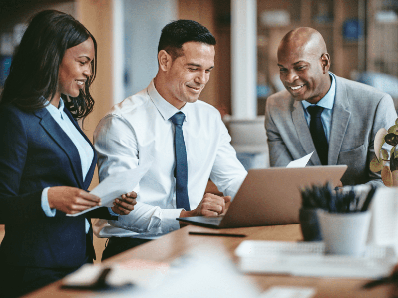 Business owner and employees have a meeting about seasonal cash flow