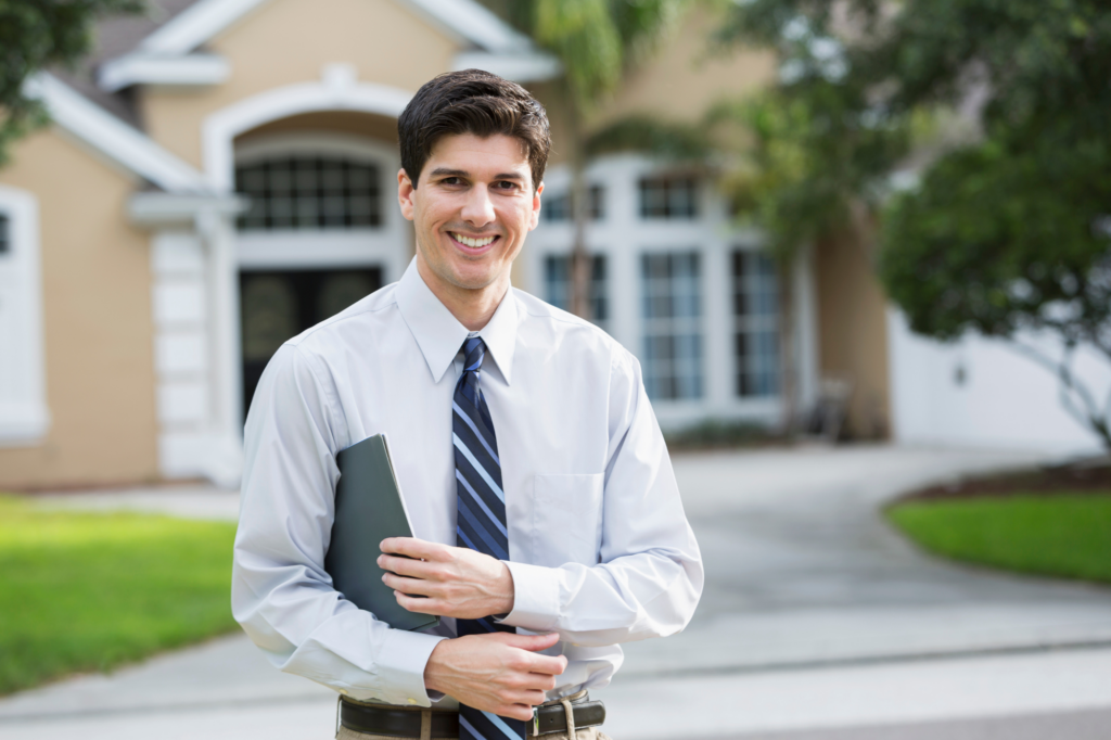 A man holding a folder of files stands in front of a house, smiling directly at the camera, concept photo of a businessman using his home equity as leverage for a second mortgage loan