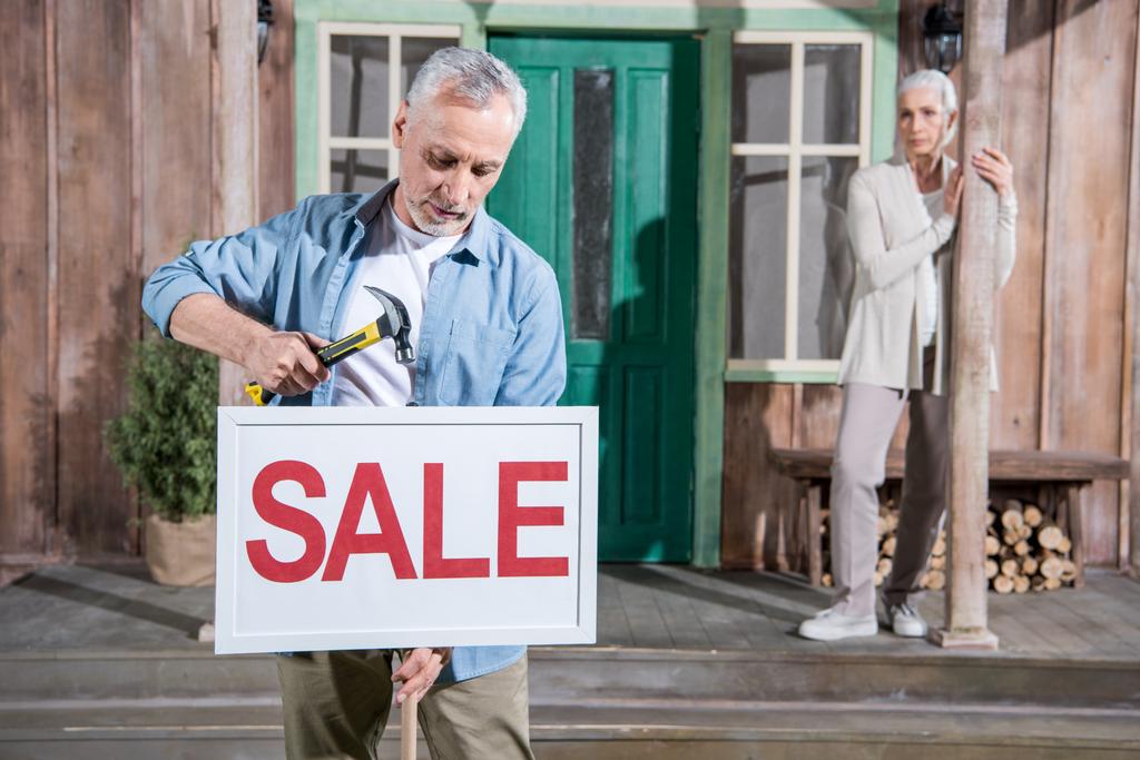 Stock Photo Couple Selling Their House
