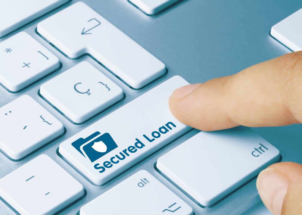 Stock Photo Secured Loan Written Blue Key Metallic Keyboard Finger Pressing Key
