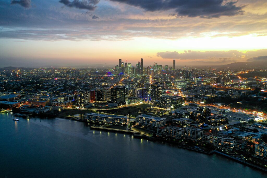 Majestic aerial photo of an Australian coast and city skyline at dusk