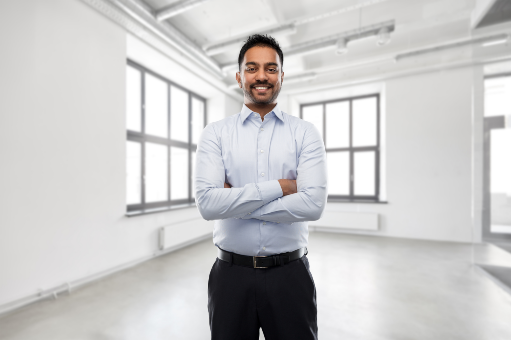 Man confidently standing and posing, showing anyone can apply for SMSF loans