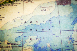 An image of the South China Sea map displaying overlapping territorial claims, disputed zones, and strategic hotspots central to the South China Sea dispute.