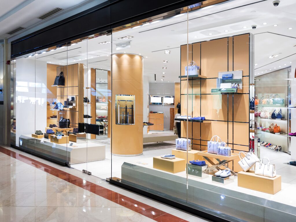 Photo of a retail store’s window display, modern store design with black, white, and wood tones, interior design funded with fitout finance