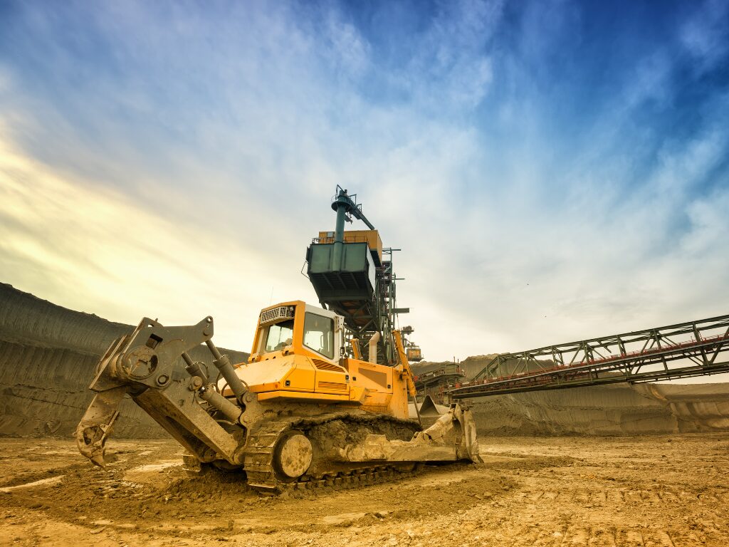 Atmospheric photo of a large wheeled equipment for drilling in the mining industry financed through no-doc equipment finance in Australia