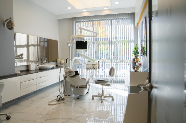 A refurbished clinic room with a modern, neat interior design and advanced medical equipment—showcasing the benefits of medical fitout finance and medical fitout funding in creating a well-equipped healthcare space.