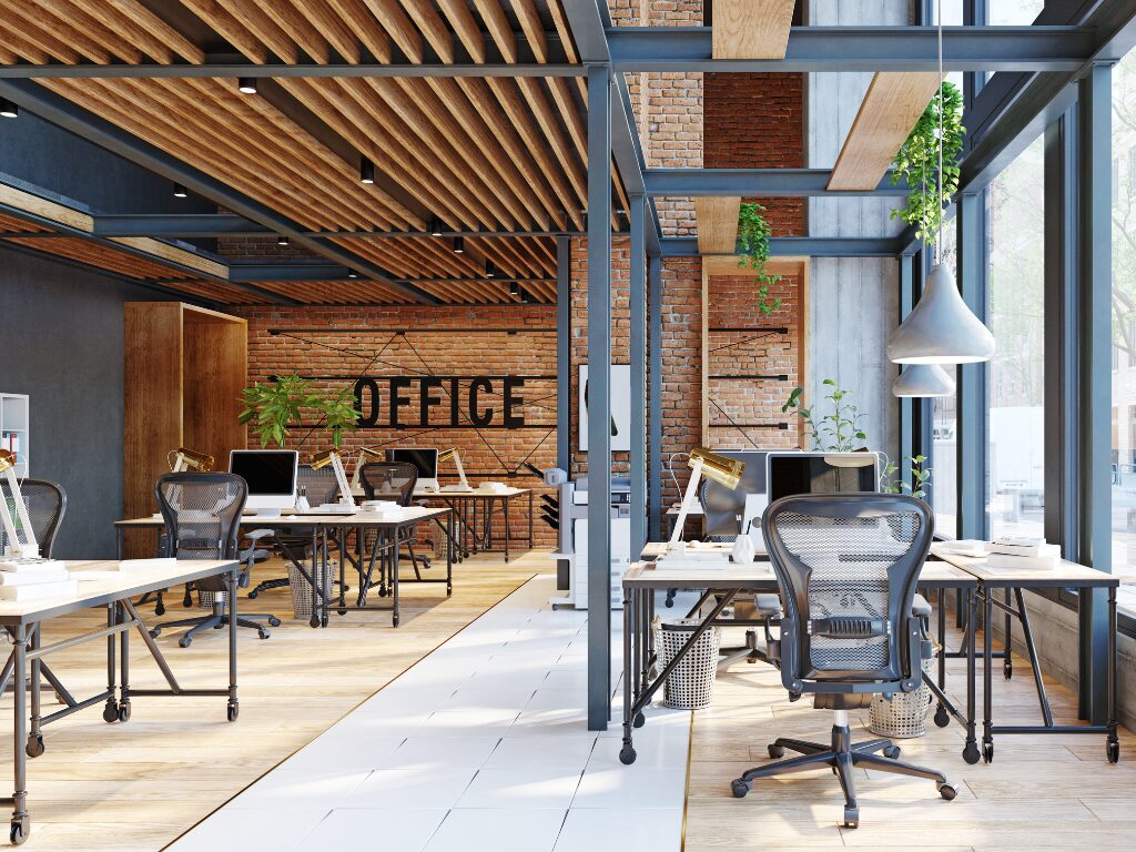 Brightly lit photo of a modern industrial-style office with an open office concept, concept photo of a renovated office with the use of fitout finance