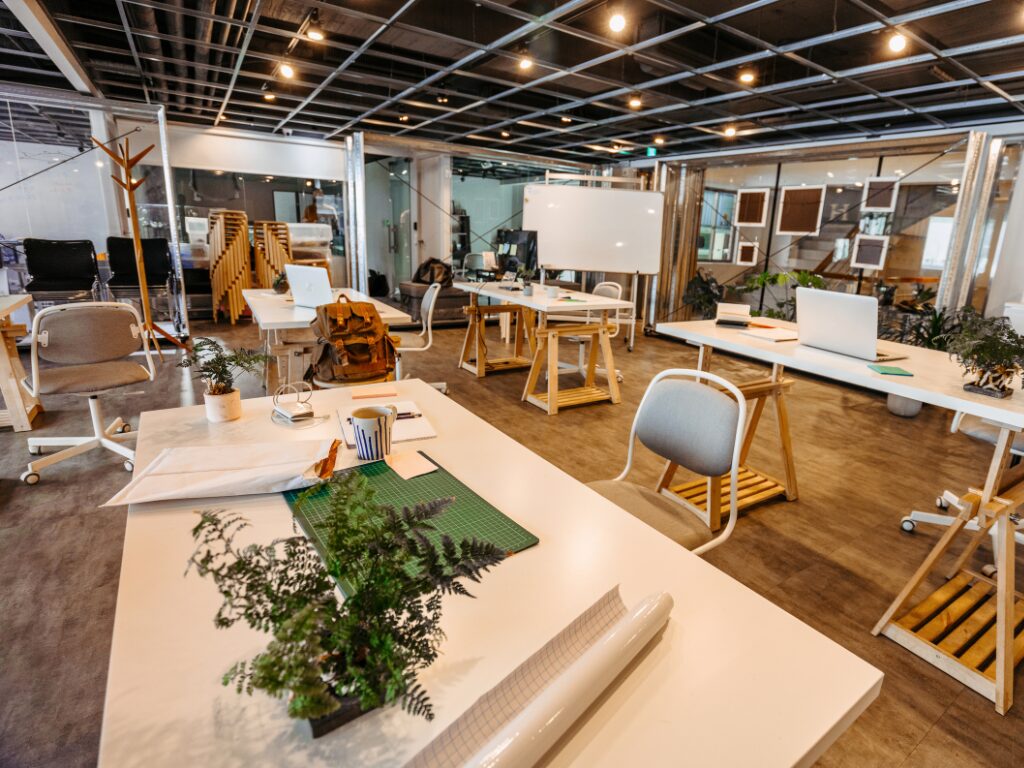 A beautiful office space with white and wooden Scandinavian-inspired design elements, a space renovated with the use of fitout finance