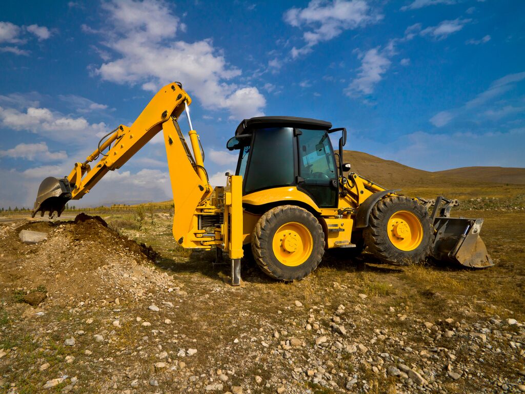 Striking photo of an industrial digger, heavy machinery, yellow goods, heavy equipment for construction and industrial works