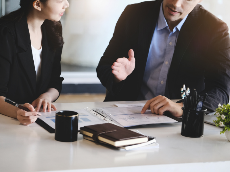 Small business owner speaking with a restructuring practitioner, facilitating small business restructuring