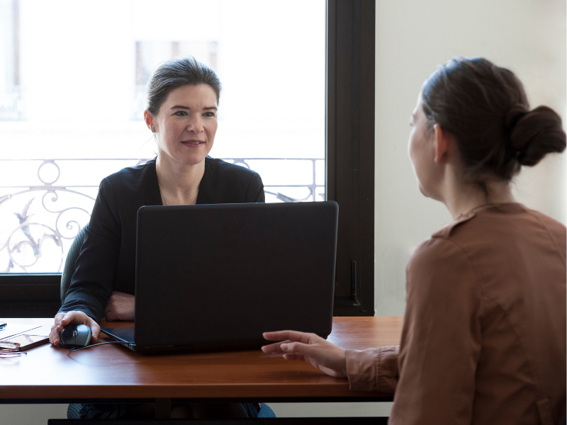 A business owner speaks with a registered restructuring practitioner regarding their restructure