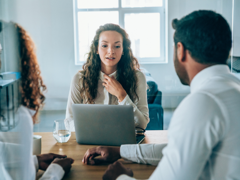 A mortgage broker or lender talks to business owners looking for a commercial line of credit