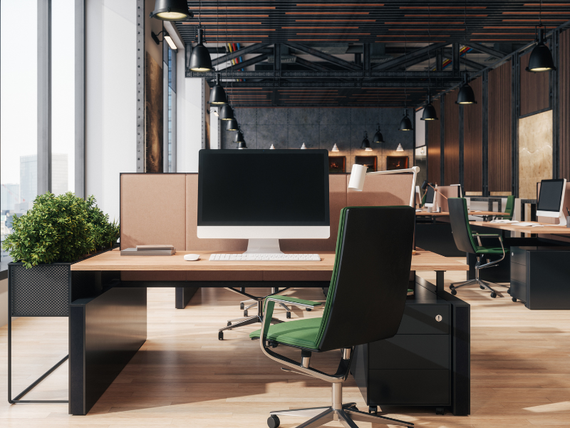 Interior design of a modern open plan office, industrial design elements with black and dark wood designs, green office chairs and plants