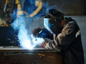A worker in a metal fabrication plant