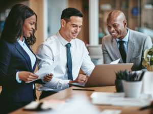 Business owner and employees have a meeting about seasonal cash flow