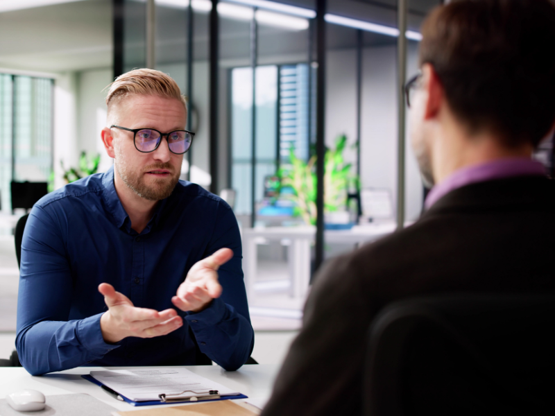 Mortgage broker speaking to a business owner about not getting finance at the moment